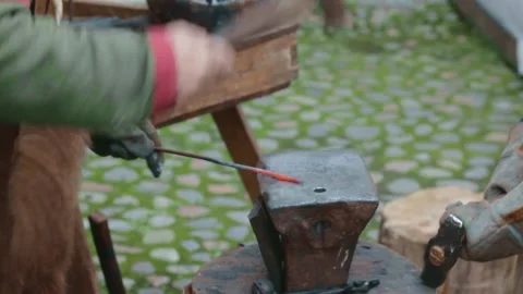 Ancient blacksmith and apprentice boy forge.medieval world manual labor. Stock Footage 160268656