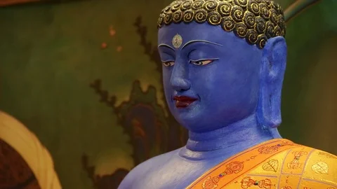 Ancient blue buddhist statue - Buddha - tilt Video stock 80001043