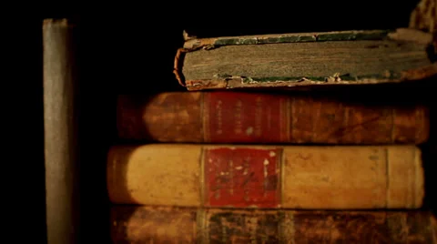Ancient books in a bookshelf Stock Footage