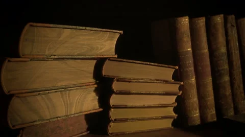 Ancient books in a bookshelf. Stock Footage 68518244