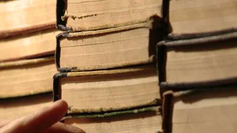 Ancient books in a bookshelf Video stock 88184022