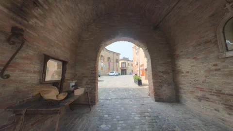 Ancient brick arch and vault at the entrance to the fortified village Stock Footage 344254304