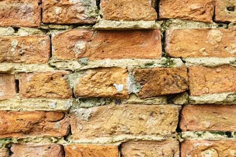 Ancient brick masonry with cracks Stock Photos