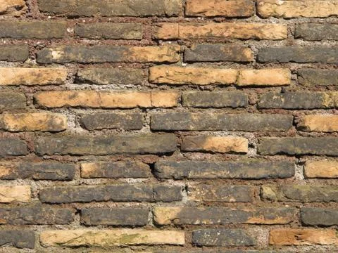 Ancient brick wall Stock Photos