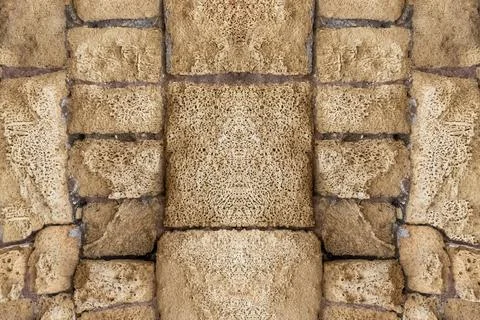 Ancient Brick Wall. A Wall of old, cracked bricks or stones, with a Weathered Foto stock