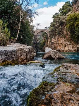 Ancient bridge over the river, view from below Stock Photos