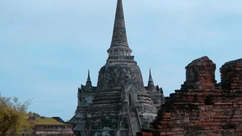 Ancient Buddhist Stupas made of red terracotta brick in Ayutthaya Stock Footage 308863734