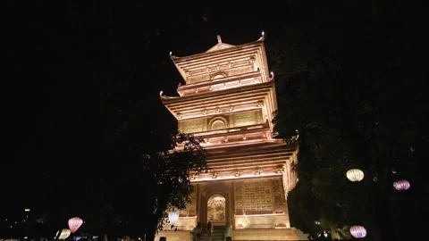 Ancient buddhist temple glowing with warm lights in Hoa Lu, Vietnam Stock Footage 336997718