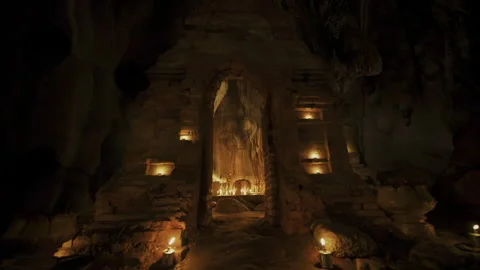 Ancient buddhist temple inside a dark cave in Cambodia Stock-Footage 331957271