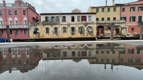 Ancient buildings are reflected in the puddle Video stock 231691857