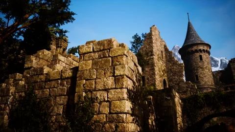 Ancient castle at sunrise with mountains in background Vídeos de archivo 166207189