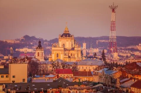 Ancient cathedral in the rays of a sunset Stock Photos