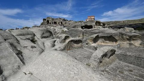 Ancient cave complex Uplisciche,  Georgian city carved into the rock Stock Photos