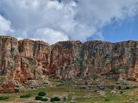 Ancient Cave Dwellings in Cliffs Stock Photos