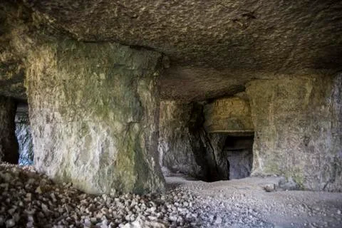 An ancient cave in the mountain Stock Photos