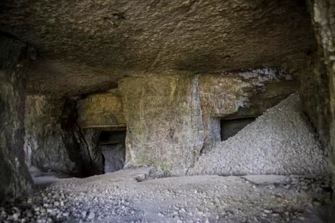 An ancient cave in the mountain Stock Photos