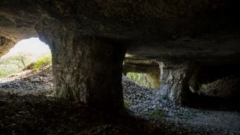 An ancient cave in the mountain Stock Photos