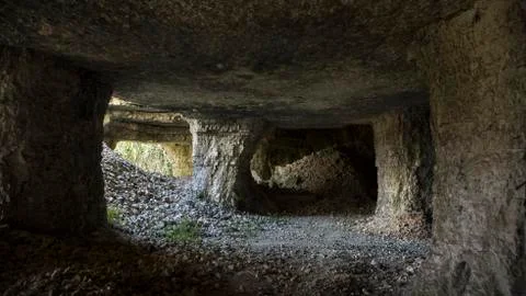 An ancient cave in the mountain Stock Photos
