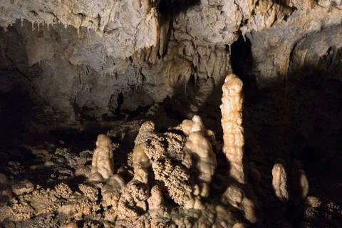 Ancient cave with stalactites and stalagmites Stock Photos