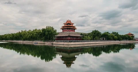 Ancient Chinese Corner Tower Architecture Reflecting in the Calm Moat Water Stock Footage 342105340