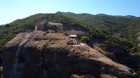 Ancient Christian Monastery Built on a Mountain Cliff in Greece Stock Footage 318610243
