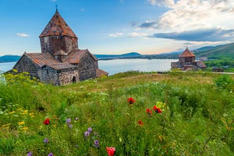 Ancient Christian monastery of Sevanavank and Lake Sevan at sunset, Armenia 스톡 사진