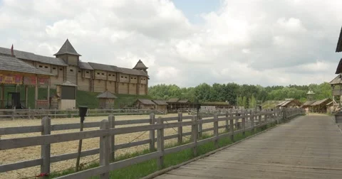 Ancient City Wall With a Gate And Towers on Background, Sandy Stadium, Floating Stock Footage 52232827