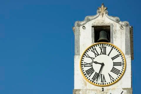 Ancient clock over blue sky with space for text Foto stock