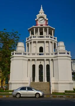 Ancient clock tower building in front of Wat Pho Stock Photos
