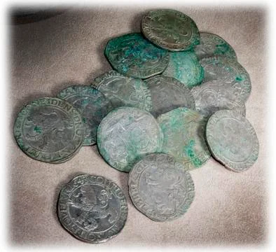 Ancient coins of different metals Stock Photos