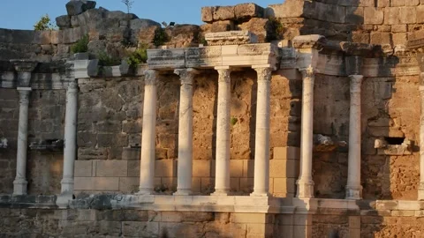 Ancient columns and remains of stone walls of the ancient theater. Stock Footage 302825460