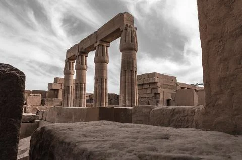 Ancient Columns with cloudy sky in Karnak Temple, Luxor Egypt Stock Photos