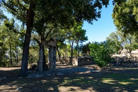 Ancient columns in shaded Triangular Forum, Pompeii Fotos Stock