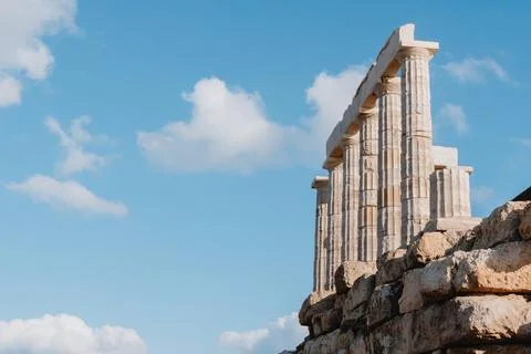 Ancient Columns Of The Temple Of Poseidon Under A Blue Sky Stock Photos