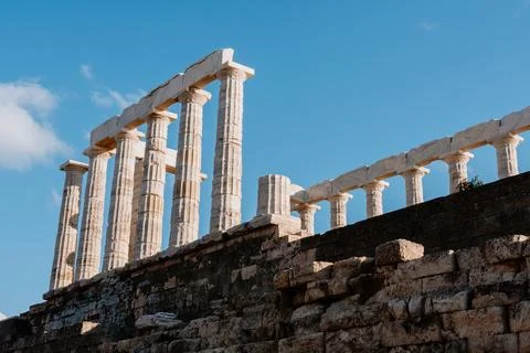 Ancient Columns Of The Temple Of Poseidon Under A Blue Sky Stock Photos