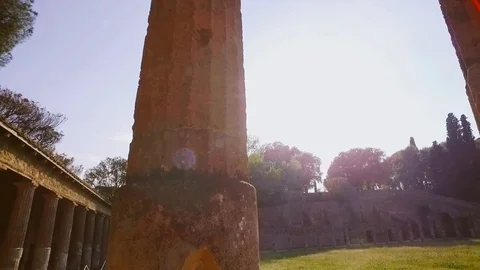 Ancient columns under bright sunlight. Historical heritage, under protection of Video stock 108729949