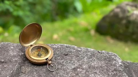 An ancient compass as a symbol of choice and decision making Stock Photos