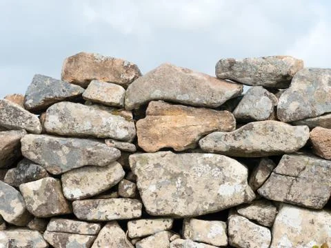 Ancient Cornish dry stone wall close up. Photos