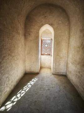 Ancient Corridor with Lattice Window Shadows Stock Photos