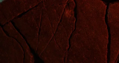 Ancient Cracked Stone Wall with reflections of fire. Video stock 273571602