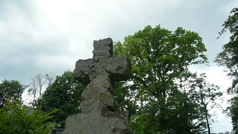 Ancient cross in a cemetery Stock Footage 115033397