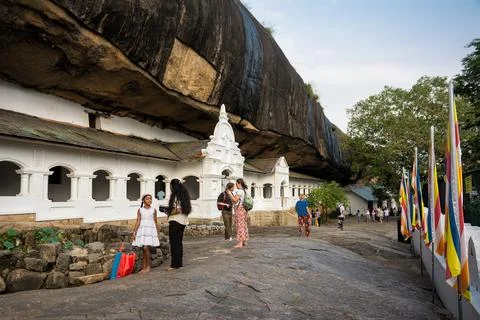 Ancient Dambulla Cave Temple under a Massive Rock Overhang in Sri Lanka Stock Photos