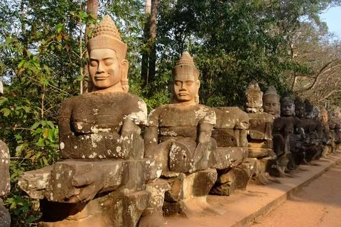 Ancient devas statues carved out of stones depicting the scene Stock Photos