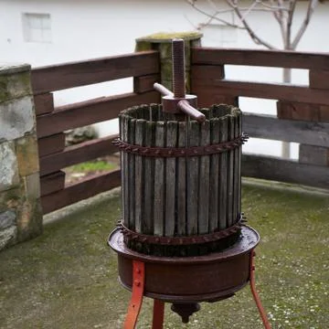 Ancient device for pressing grapes. Stock Photos