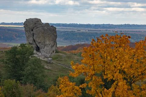Ancient Devils Rock and stone crosses in Pidkamin village Stock Photos