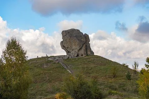 Ancient Devils Rock and stone crosses in Pidkamin village Stock Photos