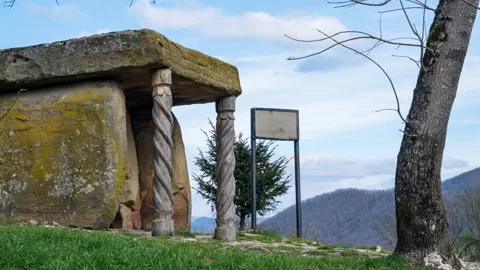 Ancient dolmen in the forest against the blue sky. Stock Footage 149556582