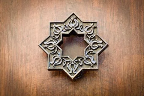 Ancient door knocker Stock Photos