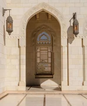 Ancient door in the mosque with patterns and ornaments Stock Photos