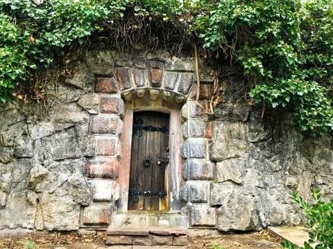 Ancient door in the wall. Stock Photos